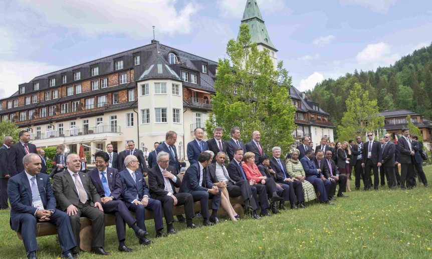 German Chancellor Merkel and other G7 summit participants gather outside the Elmau castle in Kruen
